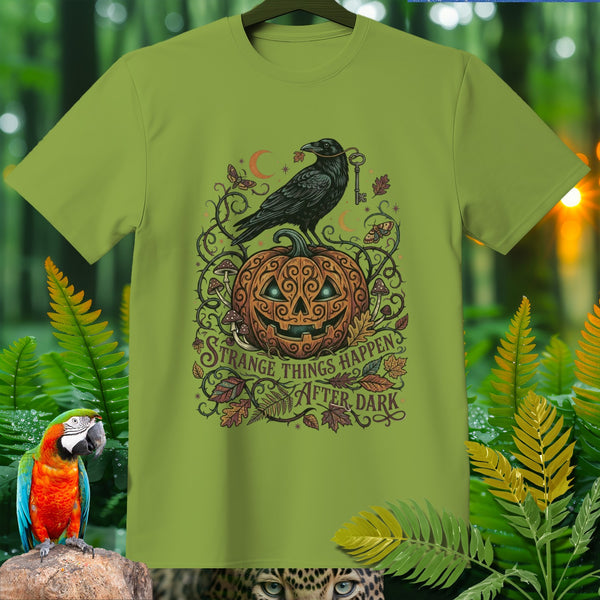 Green t-shirt with Halloween pumpkin, raven, and text "Strange Things Happen After Dark".