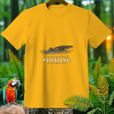 Yellow t-shirt with a graphic of an alligator in water and text reading 