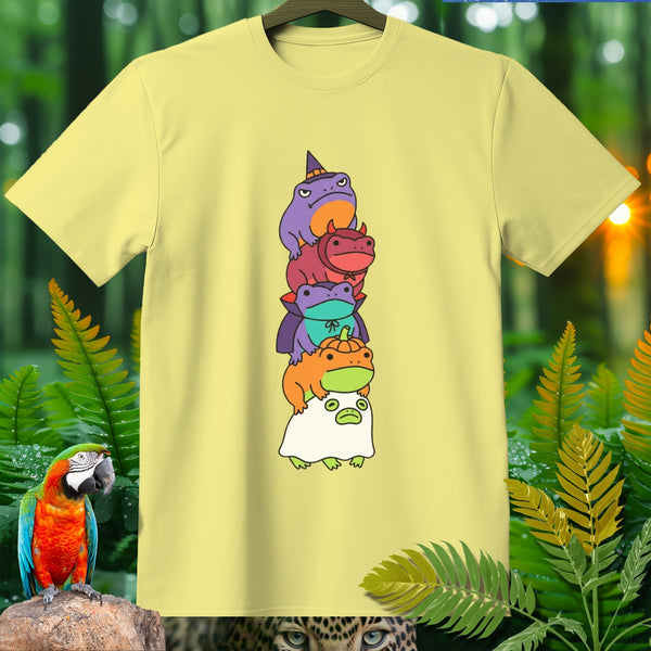 Yellow t-shirt featuring a stack of five Halloween-themed frogs and a ghost-like creature.
