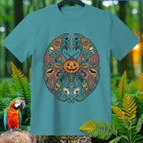 Teal t-shirt with a colorful Halloween mandala design featuring a pumpkin, skulls, and eyes.