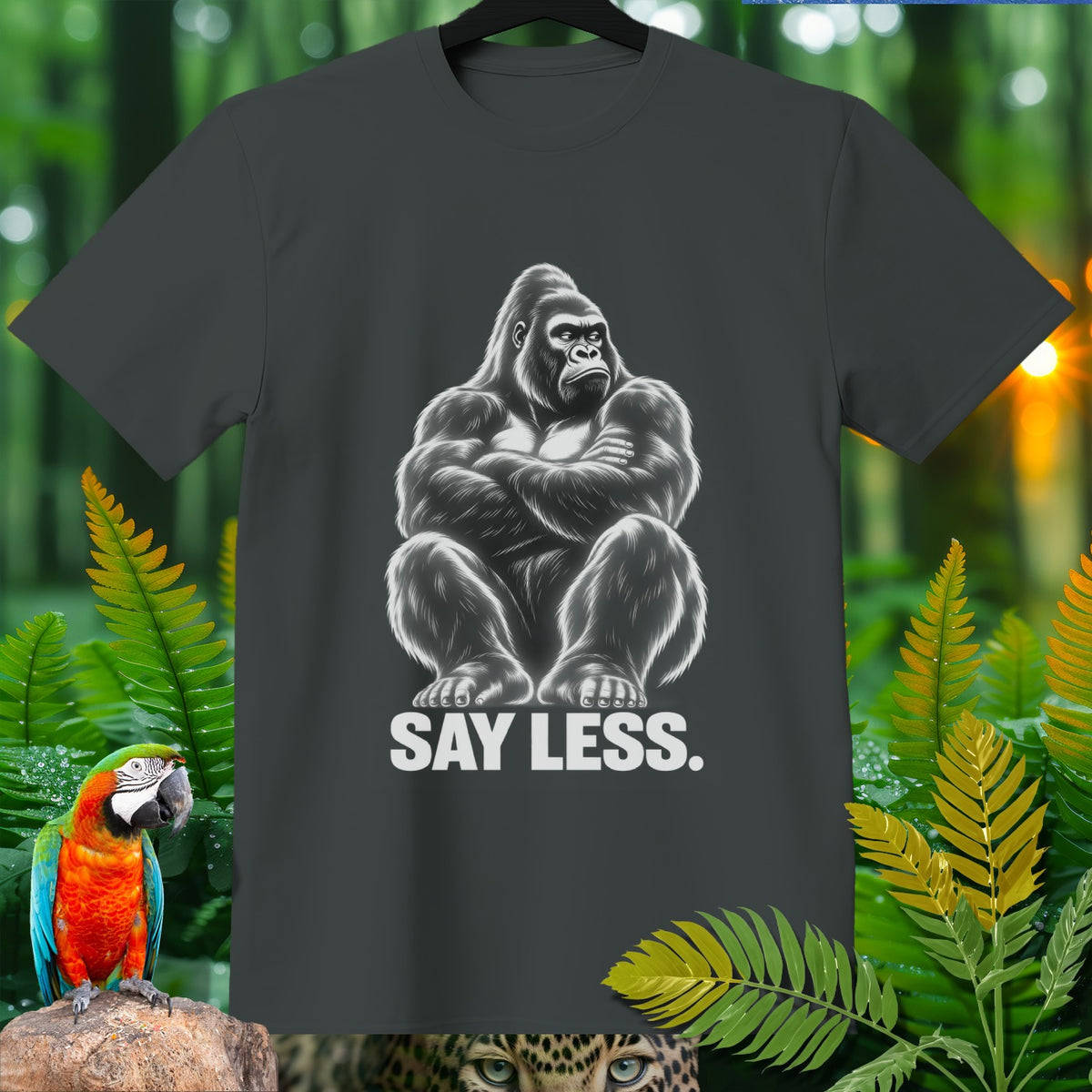 Gray t-shirt with a graphic of a gorilla sitting and the text "SAY LESS."