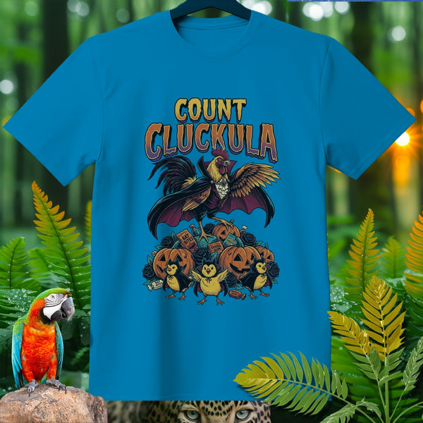 Count Cluckula rooster in vampire cape with pumpkins and chicks, Halloween themed shirt design.