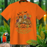 Orange t-shirt with a leopard, pumpkins, and text 