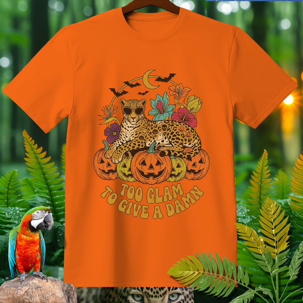 Orange t-shirt with a leopard, pumpkins, and text "Too Glam To Give A Damn".