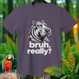 Purple t-shirt with a black and white illustration of a hippo and the text 