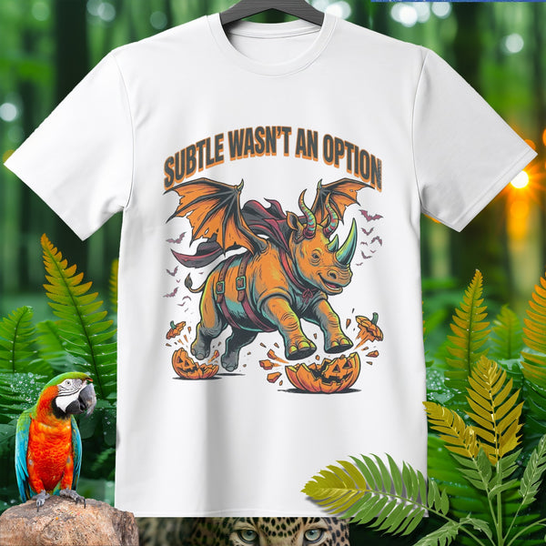 White t-shirt with a winged rhino breaking through pumpkins, text "SUBTLE WASN'T AN OPTION."