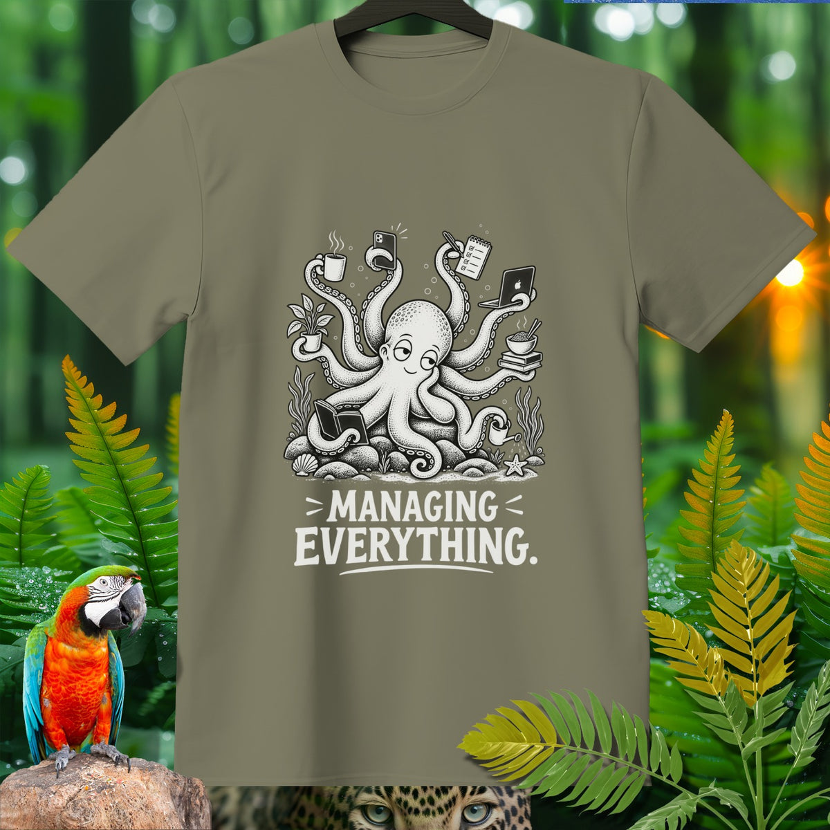 T-shirt graphic of an octopus managing many tasks with text "MANAGING EVERYTHING."