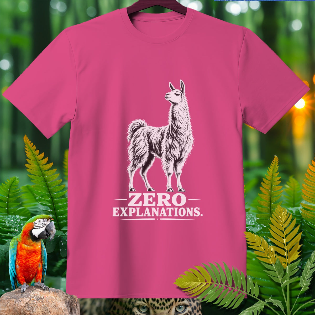 Pink t-shirt with a llama graphic and "ZERO EXPLANATIONS." text.