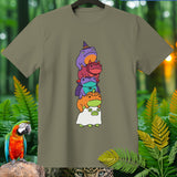 Stack of five cartoon frogs dressed in Halloween costumes on a tan t-shirt.