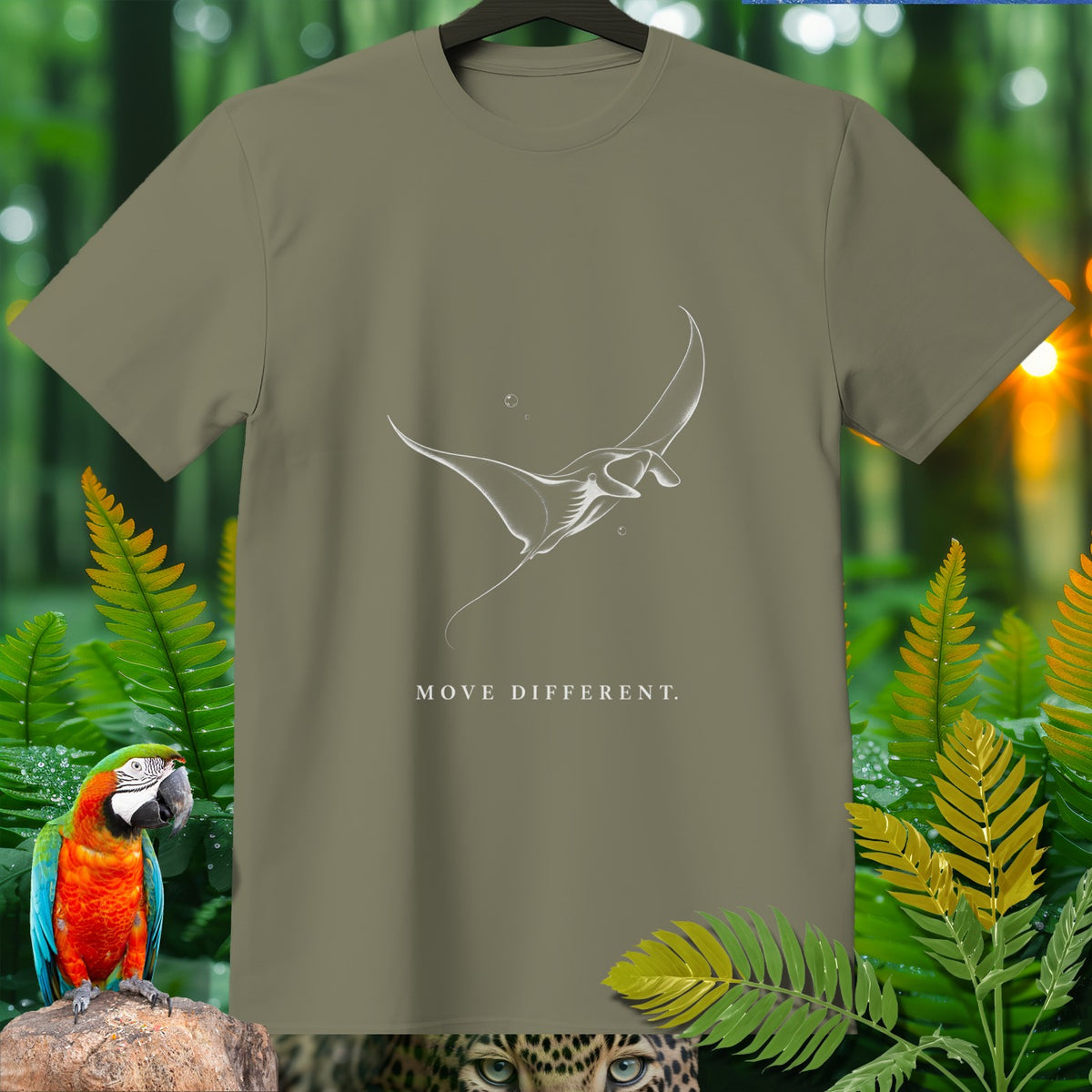 Olive green t-shirt with white manta ray graphic and "MOVE DIFFERENT." text.