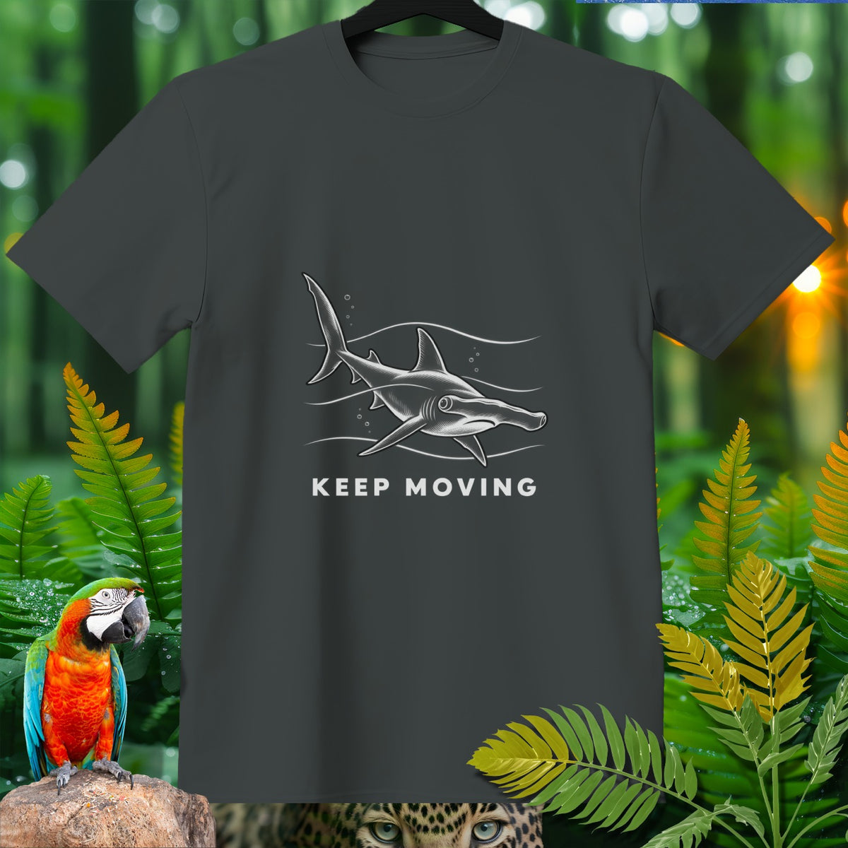 Dark grey t-shirt with a hammerhead shark graphic and "KEEP MOVING" text.