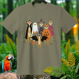 Group of meerkats dressed in Halloween costumes including vampire, ghost, witch, and fairy.