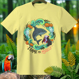 Yellow t-shirt with a Halloween-themed graphic featuring a shark, vampire, and pumpkins.