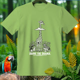 Light green t-shirt with graphic of giraffe above other animals, text 