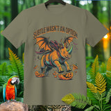T-shirt with a winged rhinoceros breaking a jack-o'-lantern, with text 