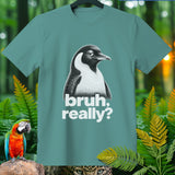 Teal t-shirt with a penguin graphic and text 