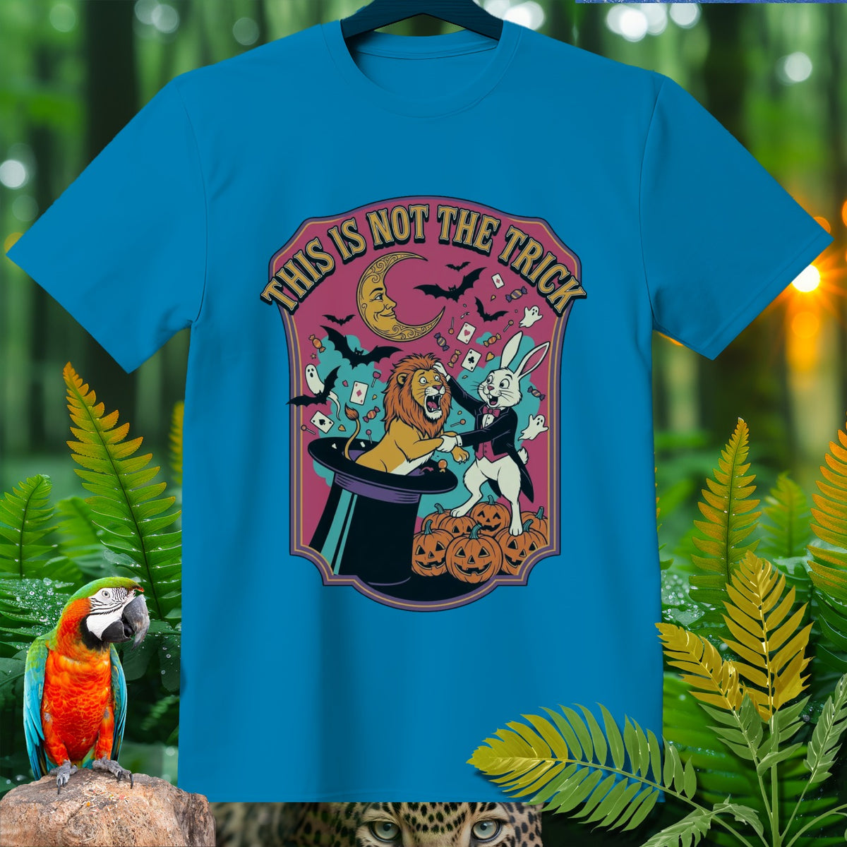 Lion and rabbit performing magic tricks on t-shirt with text "THIS IS NOT THE TRICK".