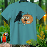 Teal t-shirt with a crow and a pumpkin named Steve wearing glasses and a tie.