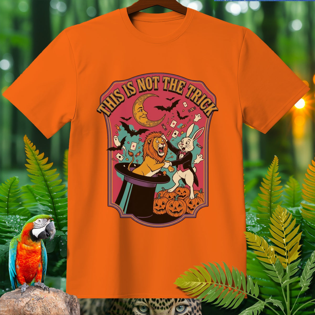 Orange t-shirt with a Halloween magic show graphic.