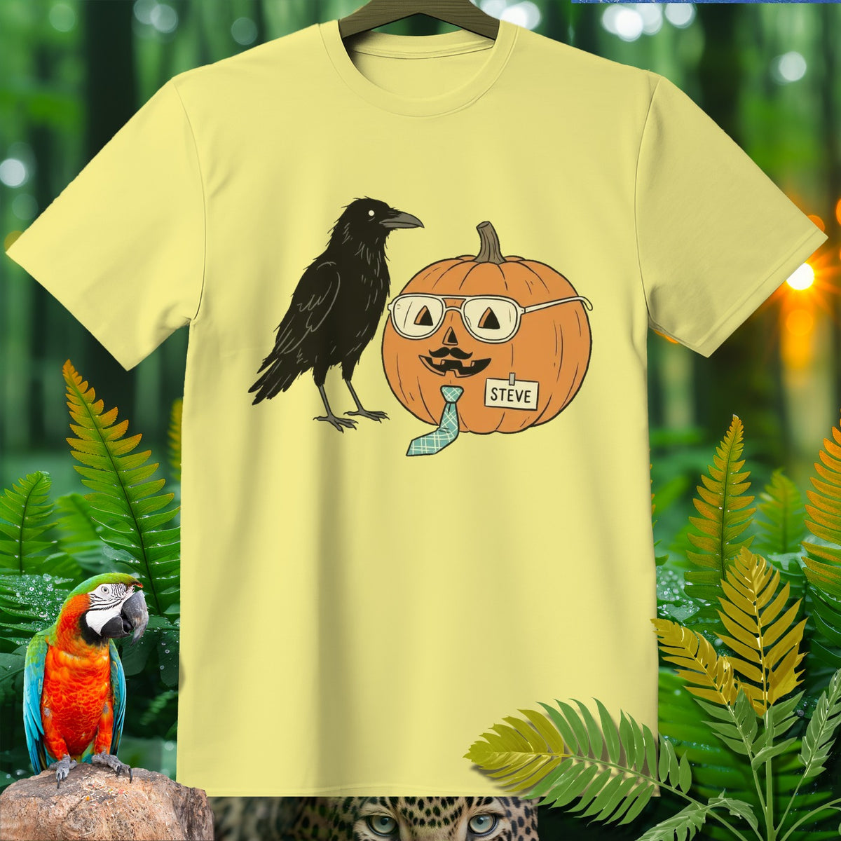 Yellow t-shirt with crow and a pumpkin wearing glasses and a tie named Steve.