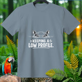Grey t-shirt with cartoon hippo peeking from water and text 