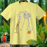 Meerkats offer candy to a giraffe skeleton with a Halloween pumpkin.