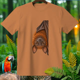 Brown t-shirt with a detailed illustration of a hanging bat and jungle foliage.