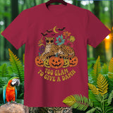 Maroon t-shirt with a leopard on pumpkins and text 