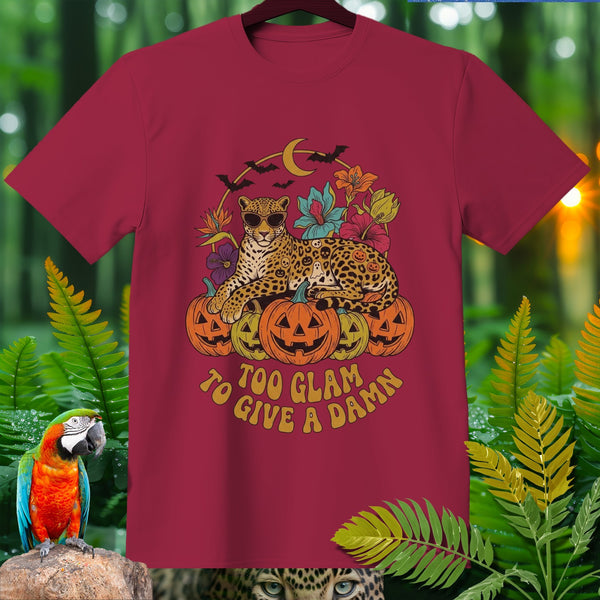 Maroon t-shirt with a leopard on pumpkins and text "TOO GLAM TO GIVE A DAMN".