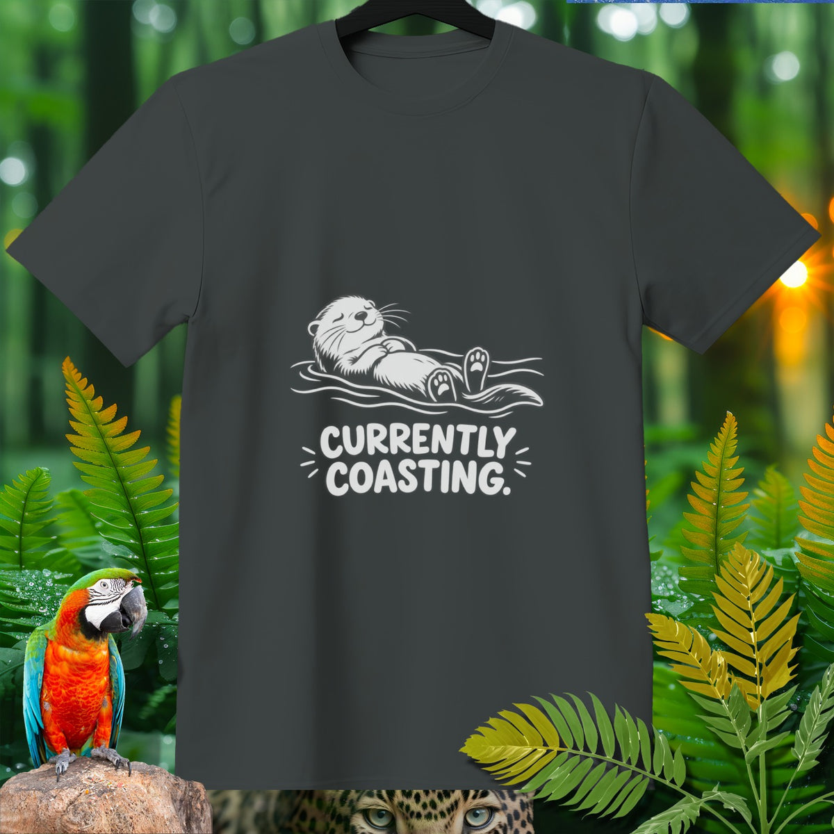 Dark gray t-shirt with white graphic of otter floating and text "CURRENTLY COASTING."