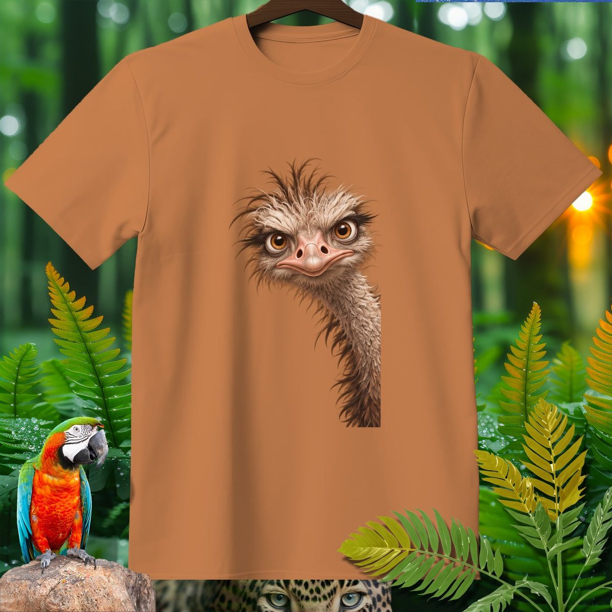 Brown t-shirt with a cartoon ostrich face graphic, surrounded by foliage and a parrot.