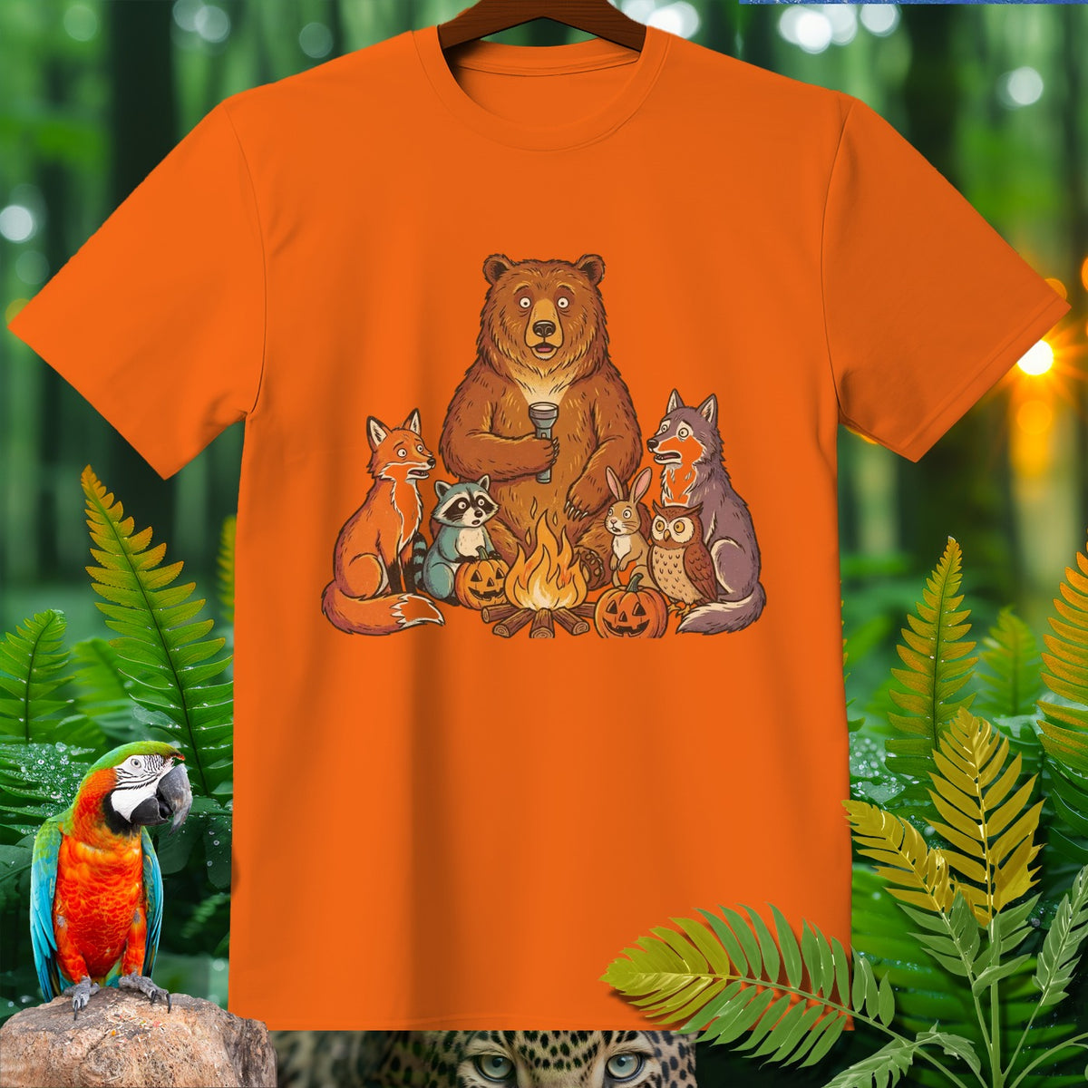 Bear, fox, raccoon, rabbit, wolf, and owl gathered around a campfire with pumpkins.