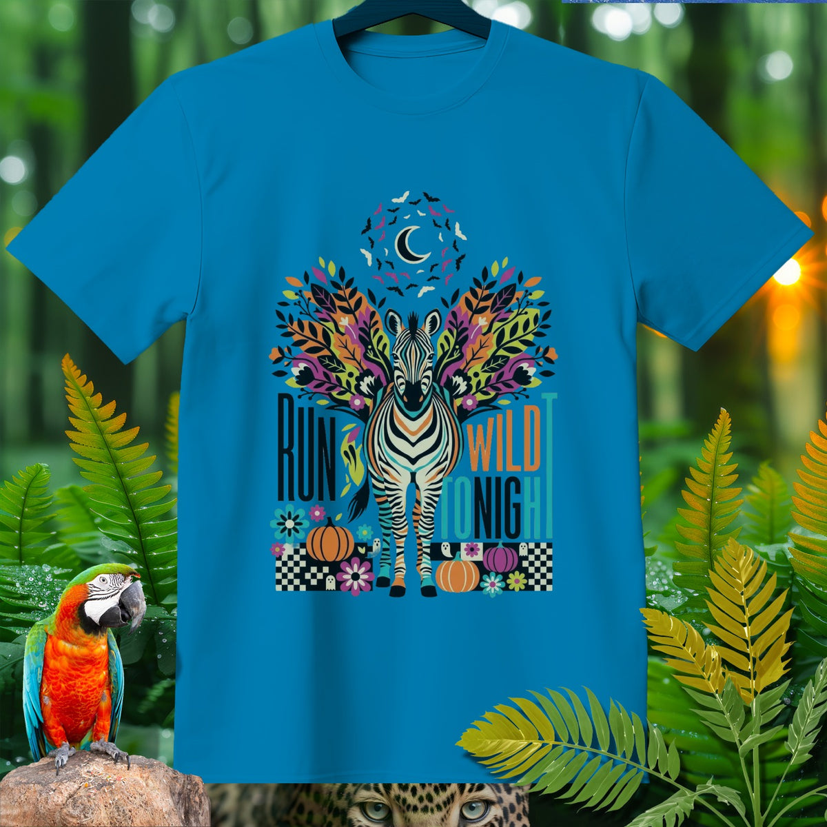 Blue t-shirt with zebra, moon, bats, pumpkins, and text "RUN WILD TONIGHT."