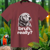 Maroon t-shirt with a sketch of a dog's face and text 