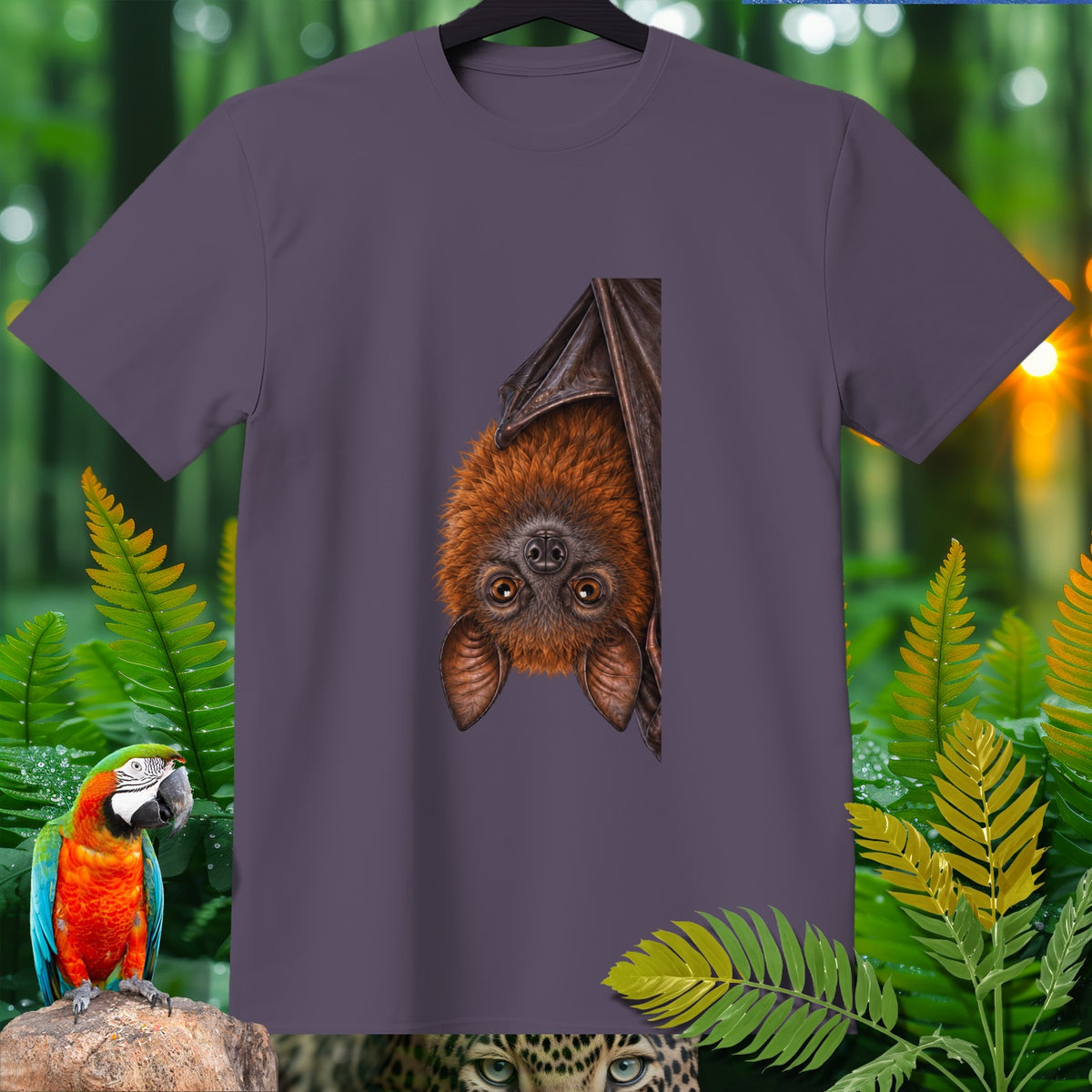 Gray t-shirt with a fruit bat illustration and jungle foliage and animals.