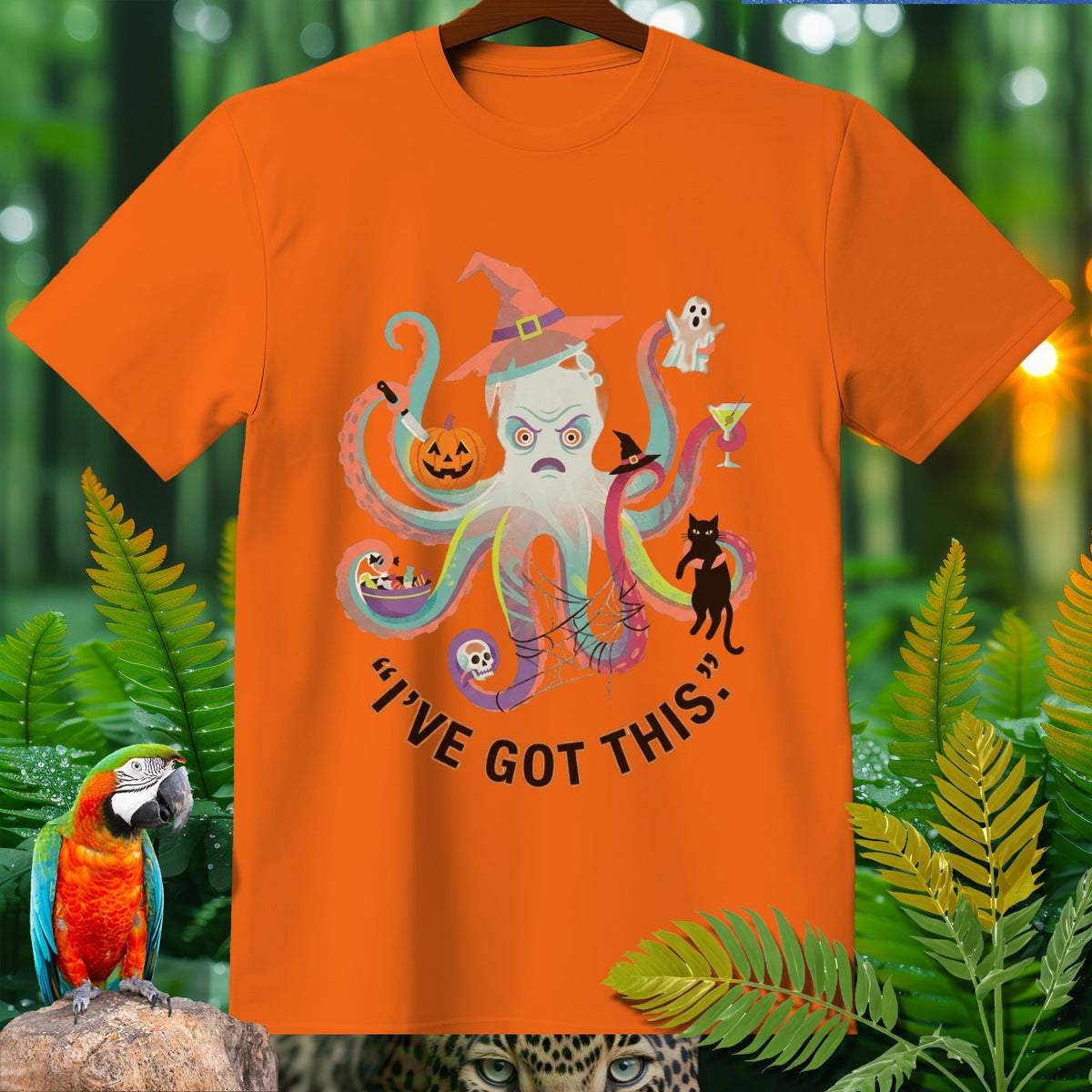 Orange Halloween t-shirt with a witch octopus graphic and text "I'VE GOT THIS."