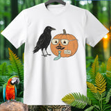 White t-shirt with a crow and a pumpkin with sunglasses and a name tag reading STEVE.