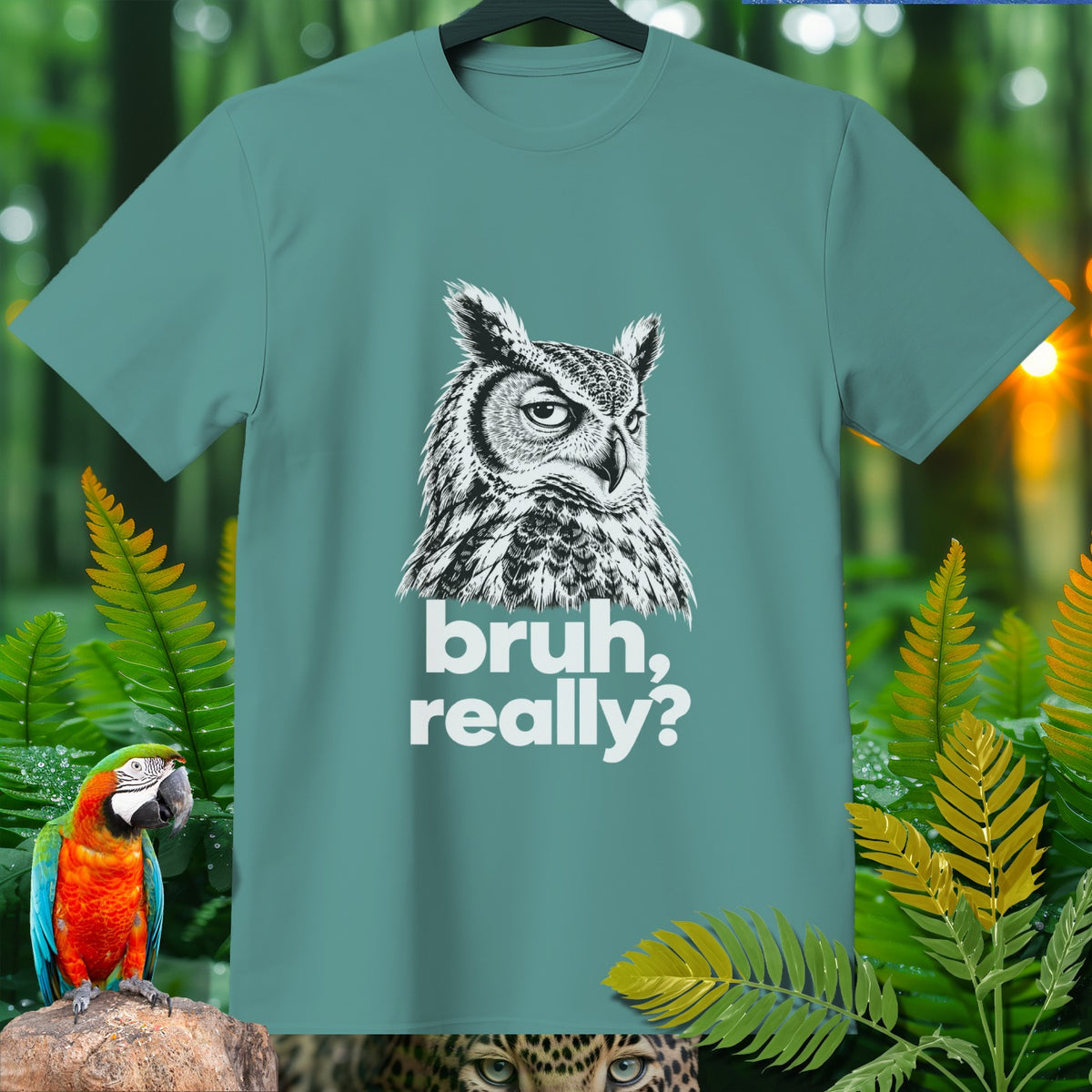Teal t-shirt with a black and white owl graphic and text "bruh, really?".