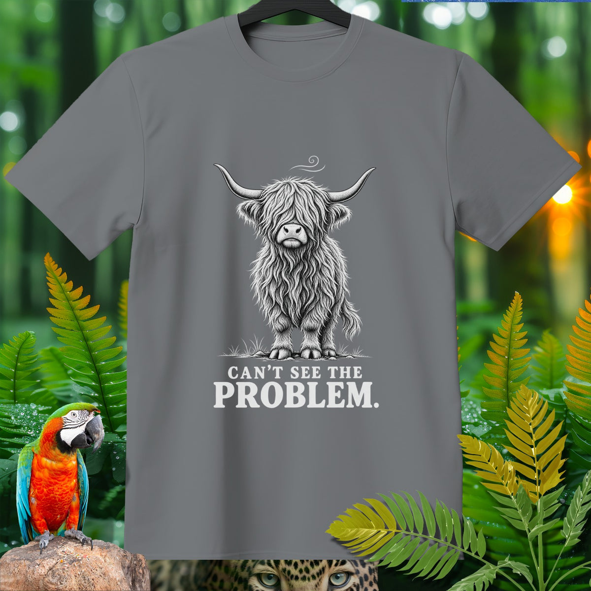 Gray t-shirt with illustration of a shaggy Highland cow and text "CAN'T SEE THE PROBLEM."