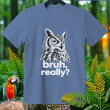 Blue t-shirt with black and white owl graphic and text 