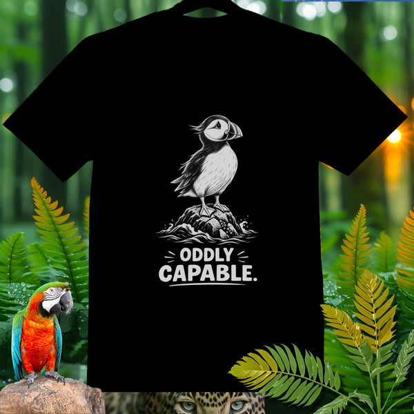 Black t-shirt with a puffin graphic and text "Oddly Capable."