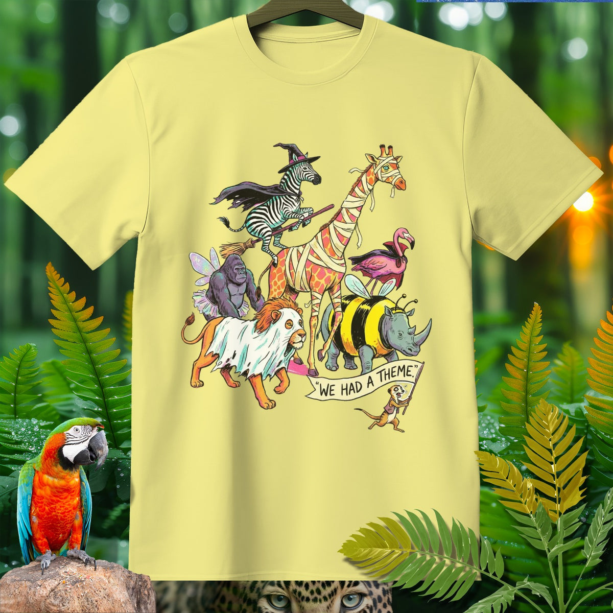 T-shirt with cartoon animals dressed for Halloween and a banner that reads "We Had a Theme".