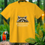 Yellow t-shirt with a raccoon peeking over and text "QUESTIONABLE INTENTIONS."