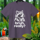 Purple t-shirt with a raccoon graphic and text 