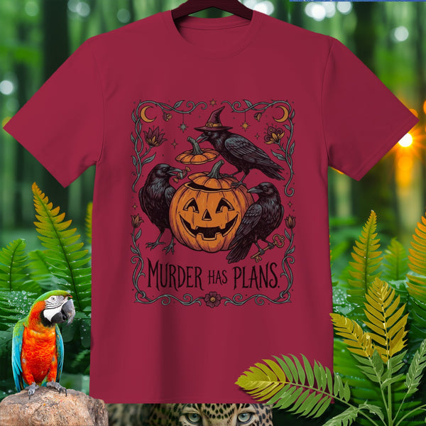 Maroon t-shirt with a Halloween design featuring crows, a pumpkin, and the text "Murder Has Plans".