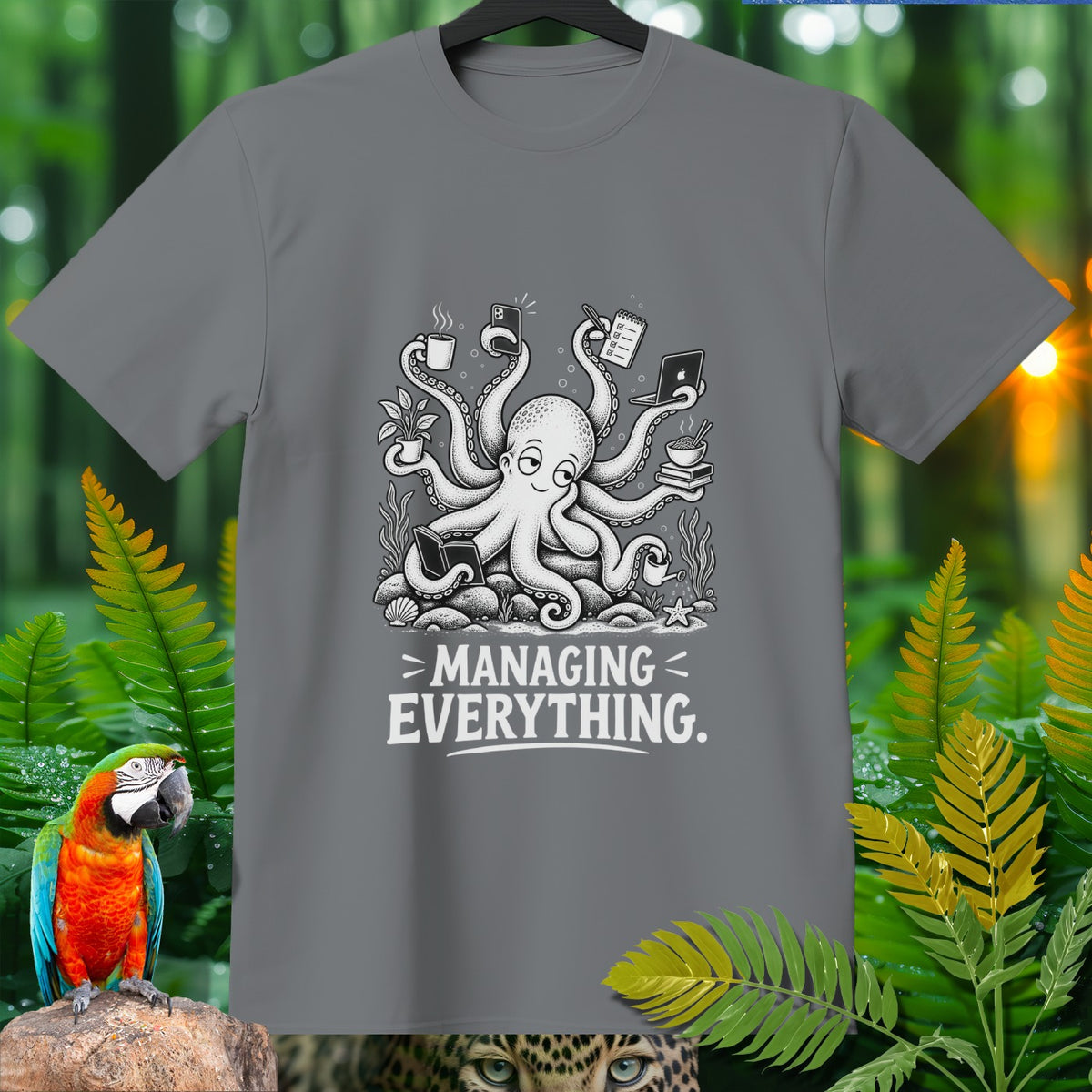 Gray t-shirt with an octopus juggling items and the text "> MANAGING EVERYTHING."