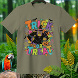 Gorilla in witch hat and cape holding pumpkin trick-or-treat bag, text 