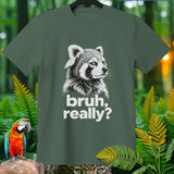 Green t-shirt with a black and white raccoon graphic and 