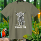 T-shirt with sketch of a fluffy Highland cow and text 
