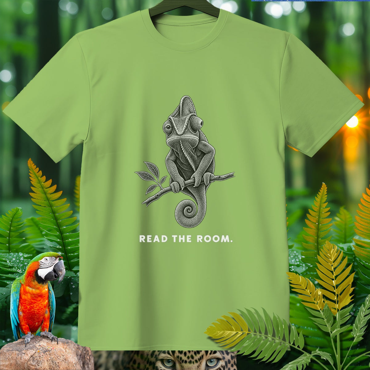 Light green t-shirt with a black and white chameleon graphic and text "READ THE ROOM."
